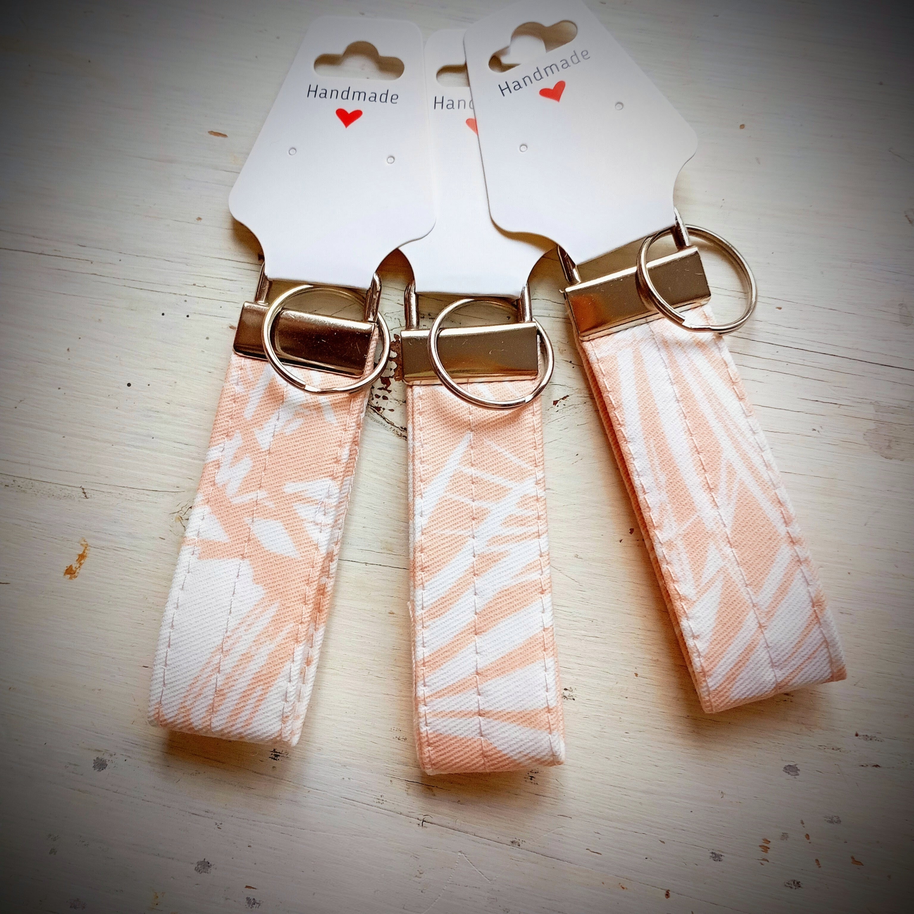 Schlüsselband Apricot-Weiß Palmblätter Baumwolle